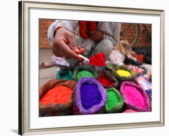 Dye Trader Offers His Brightly Coloured Wares in a Roadside Stall in Kathmandu, Nepal, Asia-David Pickford-Framed Photographic Print