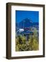 Eads Auto, Seward Alaska - a car in the trees under a large mountain-null-Framed Photographic Print