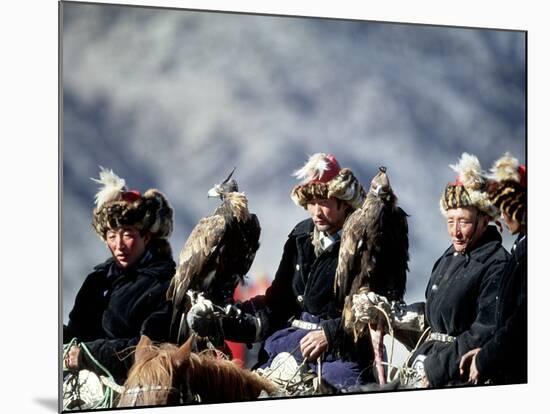 Eagle Hunters at the Golden Eagle Festival, Mongolia-Amos Nachoum-Mounted Photographic Print