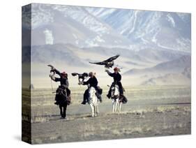 Eagle Hunters Dalai Khan, Takhuu Grandfather, Son Kook Kook, Golden Eagle Festival, Mongolia-Amos Nachoum-Stretched Canvas
