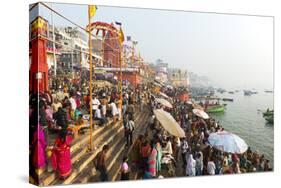 Early Morning Bathers on the Banks of the River Ganges, Varanasi (Benares), Uttar Pradesh, India-Jordan Banks-Stretched Canvas