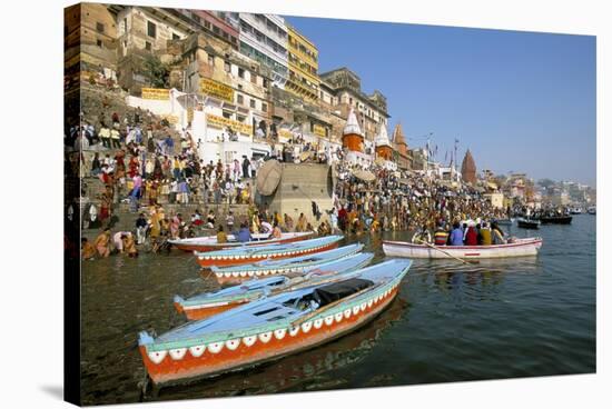 Early Morning Bathing in the Holy River Ganges Along Dasaswamedh Ghat, Uttar Pradesh State, India-Gavin Hellier-Stretched Canvas