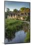 Early Spring morning view of the beautiful Cotswolds cottages at Arlington Row in Bibury-Adam Burton-Mounted Photographic Print