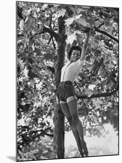 Eartha Kitt Playing in the Tree-Gordon Parks-Mounted Premium Photographic Print