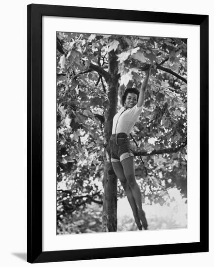 Eartha Kitt Playing in the Tree-Gordon Parks-Framed Premium Photographic Print