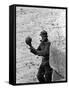 East German Border Guard Tossing Ball over Berlin Wall after German boy accidently threw it over-Paul Schutzer-Framed Stretched Canvas