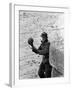 East German Border Guard Tossing Ball over Berlin Wall after German boy accidently threw it over-Paul Schutzer-Framed Photographic Print