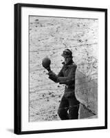 East German Border Guard Tossing Ball over Berlin Wall after German boy accidently threw it over-Paul Schutzer-Framed Photographic Print