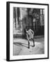 East German Girl Playing with a Spinning Top-Ralph Crane-Framed Photographic Print