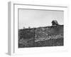 East German's Hand Reaching Over Glass Shards Embedded in Top of the Newly Constructed Berlin Wall-Paul Schutzer-Framed Premium Photographic Print