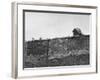 'East German's Hand Reaching Over Glass Shards Embedded in Top of the ...