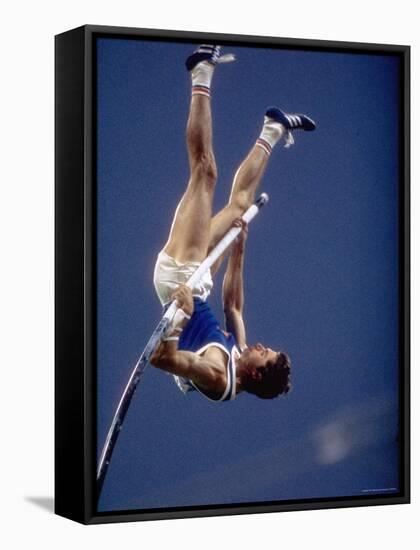 East Germany's Wolfgang Nordwig in Action During Pole Vaulting Event at the Summer Olympics-John Dominis-Framed Stretched Canvas