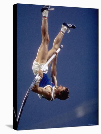 East Germany's Wolfgang Nordwig in Action During Pole Vaulting Event at the Summer Olympics-John Dominis-Stretched Canvas