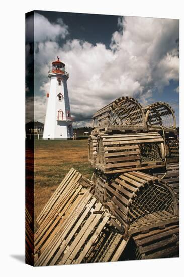 East Point Lighthouse and Lobster Traps, Prince Edward Island, Canada-Walter Bibikow-Stretched Canvas