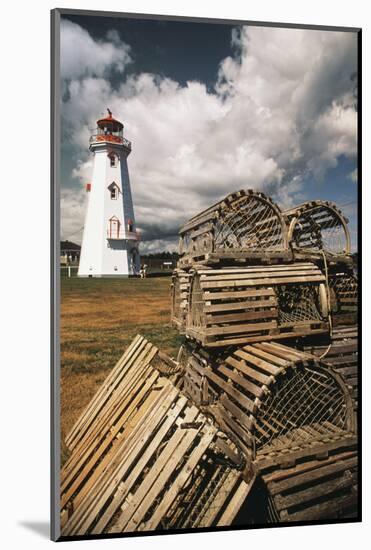 East Point Lighthouse and Lobster Traps, Prince Edward Island, Canada-Walter Bibikow-Mounted Photographic Print