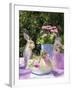 Easter Egg and Easter Bunny on Garden Table-C. Nidhoff-Lang-Framed Photographic Print