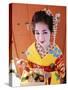 Eating Sushi, Apprentice Geisha (Maiko) Dressed in Kimono, Kyoto, Honshu, Japan-null-Stretched Canvas