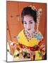 Eating Sushi, Apprentice Geisha (Maiko) Dressed in Kimono, Kyoto, Honshu, Japan-null-Mounted Photographic Print