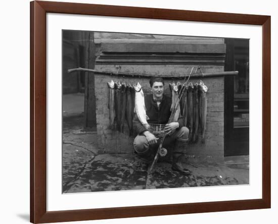 Eddie Bauer with steelhead trout Photograph - Seattle, WA-Lantern Press-Framed Art Print