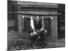 Eddie Bauer with steelhead trout Photograph - Seattle, WA-Lantern Press-Mounted Art Print