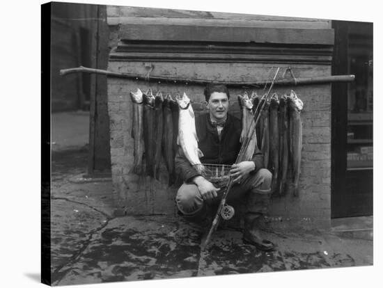 Eddie Bauer with steelhead trout Photograph - Seattle, WA-Lantern Press-Stretched Canvas