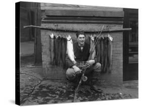 Eddie Bauer with steelhead trout Photograph - Seattle, WA-Lantern Press-Stretched Canvas