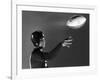 Eddie Miller of NY Giants Demonstrates Spiral Pass by Gripping Ball Along Lacing Close to the Ear-Gjon Mili-Framed Premium Photographic Print