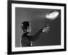 Eddie Miller of NY Giants Demonstrates Spiral Pass by Gripping Ball Along Lacing Close to the Ear-Gjon Mili-Framed Premium Photographic Print