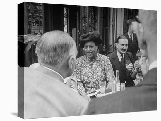 Edith S. Sampson and Cyrille Makinsky at Fouquet's Restaurant-null-Stretched Canvas