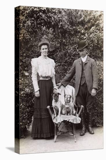 Edwardian Couple with Two Pug Dogs in a Garden-null-Stretched Canvas