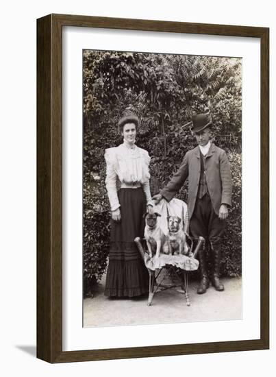 Edwardian Couple with Two Pug Dogs in a Garden-null-Framed Photographic Print