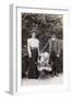 Edwardian Couple with Two Pug Dogs in a Garden-null-Framed Photographic Print