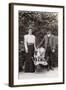 Edwardian Couple with Two Pug Dogs in a Garden-null-Framed Photographic Print