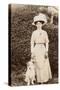 Edwardian Woman with a Terrier in a Garden-null-Stretched Canvas