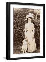 Edwardian Woman with a Terrier in a Garden-null-Framed Photographic Print