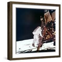 Edwin Buzz Aldrin Descends the Steps of the Lunar Module Ladder to Walk on the Moon, 1969-null-Framed Premium Photographic Print