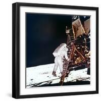 Edwin Buzz Aldrin Descends the Steps of the Lunar Module Ladder to Walk on the Moon, 1969-null-Framed Premium Photographic Print