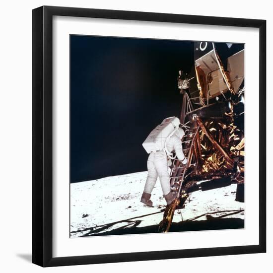 Edwin Buzz Aldrin Descends the Steps of the Lunar Module Ladder to Walk on the Moon, 1969-null-Framed Premium Photographic Print