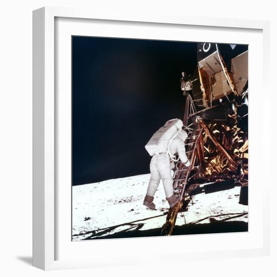 Edwin Buzz Aldrin Descends the Steps of the Lunar Module Ladder to Walk on the Moon, 1969-null-Framed Premium Photographic Print