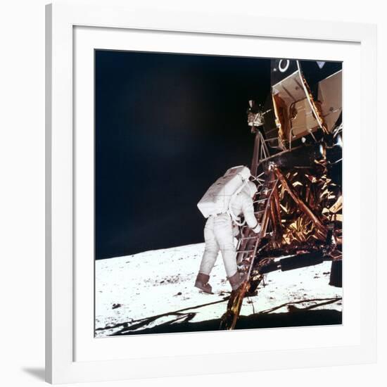 Edwin Buzz Aldrin Descends the Steps of the Lunar Module Ladder to Walk on the Moon, 1969-null-Framed Photographic Print