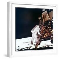 Edwin Buzz Aldrin Descends the Steps of the Lunar Module Ladder to Walk on the Moon, 1969-null-Framed Photographic Print