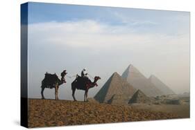 Egypt, Giza, Camel Ride and Giza Pyramid-Claudia Adams-Stretched Canvas