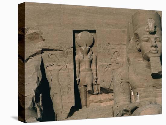 Egypt, Nubia, Abu Simbel, Great Temple of Ramses II, Facade, Niche with Statue of Sun God Ra-null-Stretched Canvas