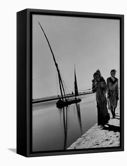 Egyptian Feluccas, Large Sailboats with Two Immensely Tall Masts, Pulled up Canal by Natives-Carl Mydans-Framed Stretched Canvas