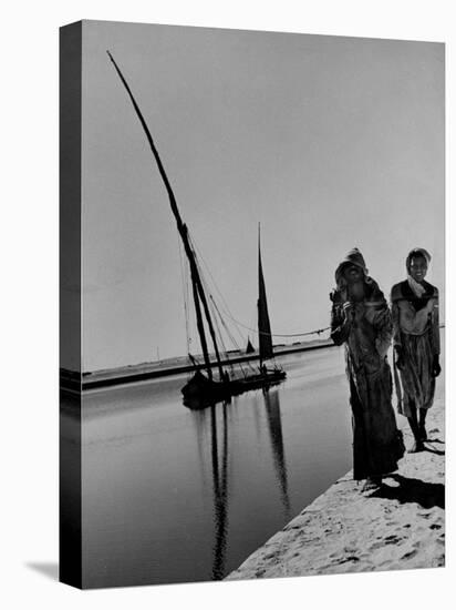 Egyptian Feluccas, Large Sailboats with Two Immensely Tall Masts, Pulled up Canal by Natives-Carl Mydans-Stretched Canvas