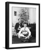 Eighteen Year Old Man with His Presents at Christmas, Ca. 1945-null-Framed Photographic Print