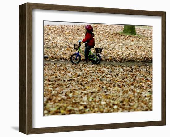 Ein Kind Radelt Am Dienstag, 8.November 2005, Zwischen Dem Herbstlaub-null-Framed Premium Photographic Print