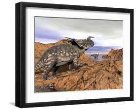 Einiosaurus Dinosaur on a Rock Observing an Argentinosaurus-null-Framed Art Print