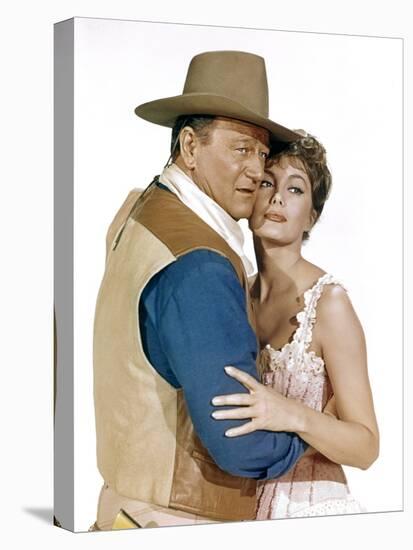 EL DORADO, 1967 directed by HOWARD HAWKS John Wayne and Charlene Holt (photo)-null-Stretched Canvas