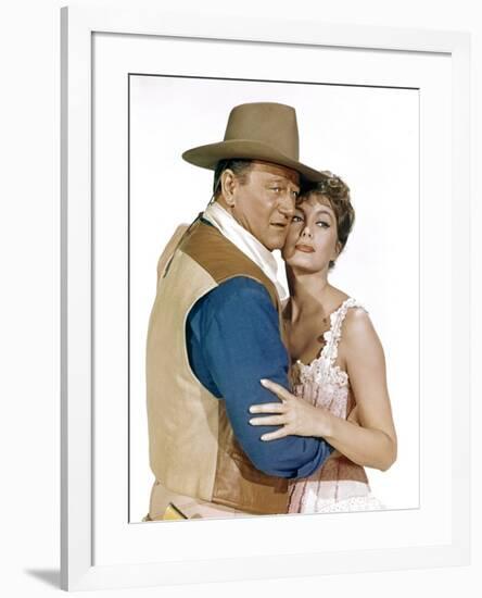 EL DORADO, 1967 directed by HOWARD HAWKS John Wayne and Charlene Holt (photo)-null-Framed Photo
